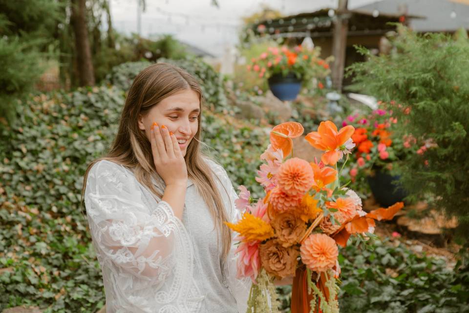 Bride first look at bouquet