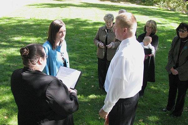 Rev. Misty Urban performs an outdoor wedding ceremony for Kurt and Susan at the Leslie Tassle Park in Grand Rapids, Michigan. Photo copyright 2010 by GRWeddingOfficiant.com