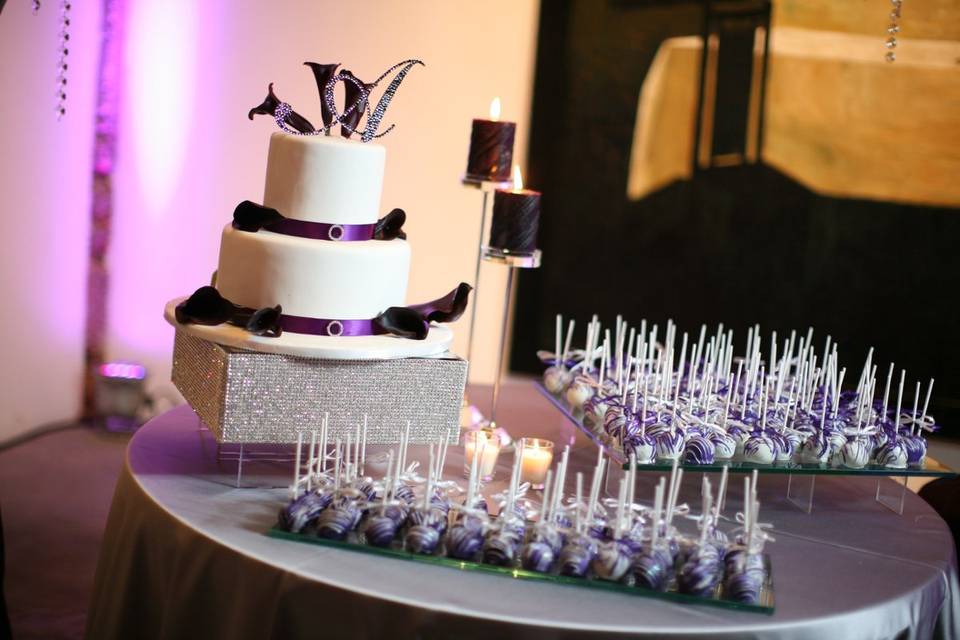 Wedding cake and cake pops.  Purple was their theme color!