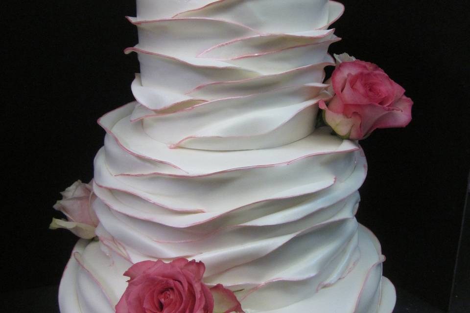 Fondant ruffles with gold edging and fresh pink roses