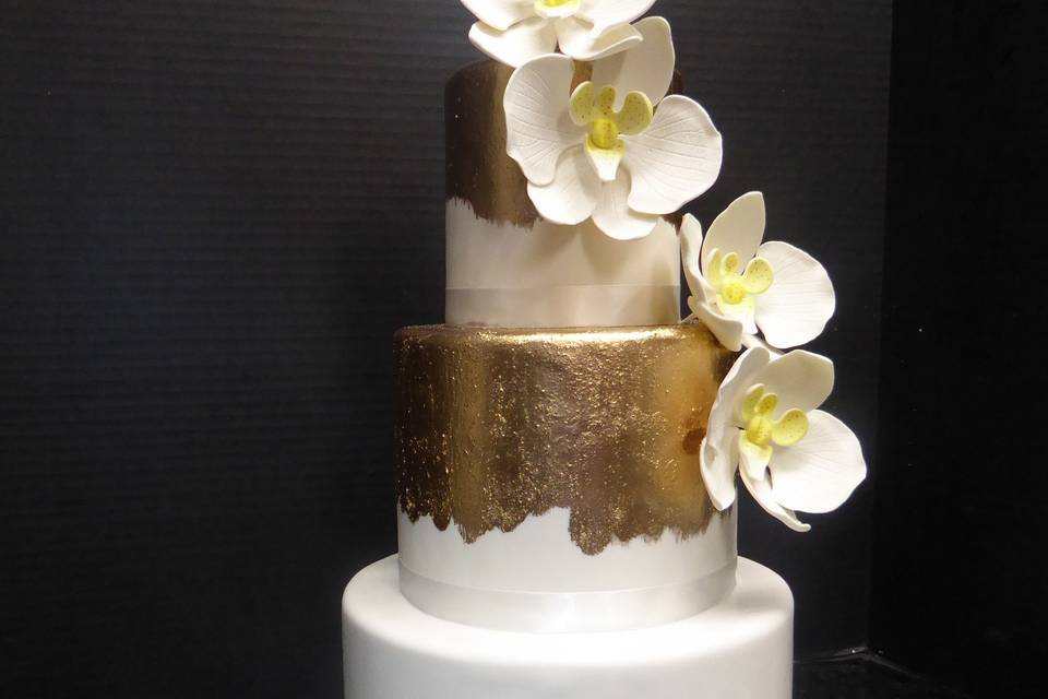 3 tier fondant with gold brush detail and sugar moth orchids