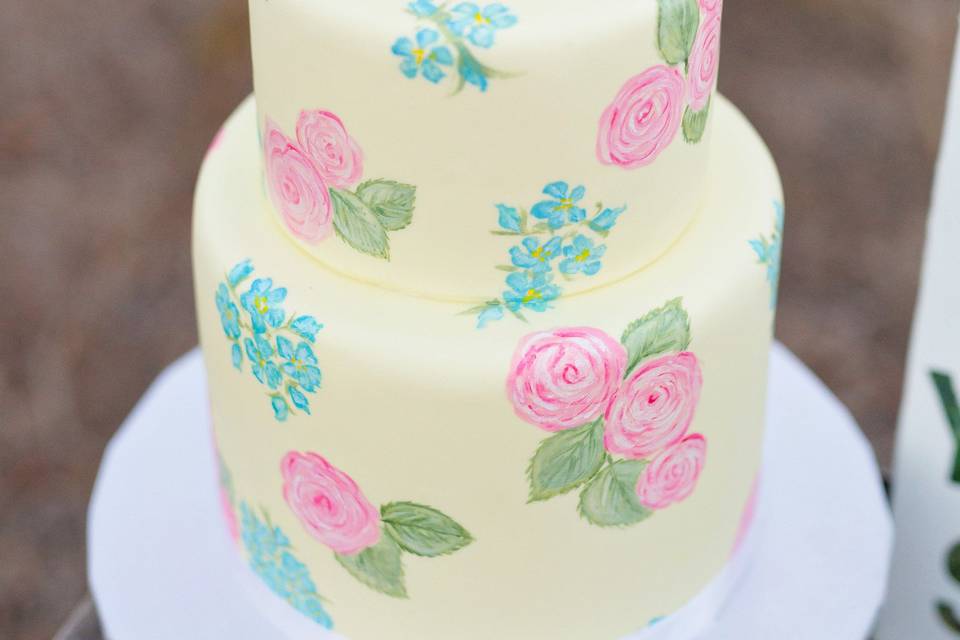 2 tier hand painted pale yellow fondant cake