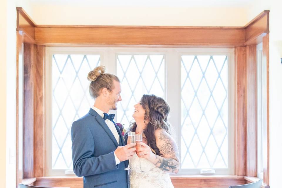 Champagne toast inside cottage