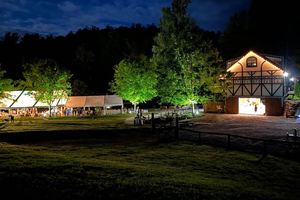 Carriage house & tent at night
