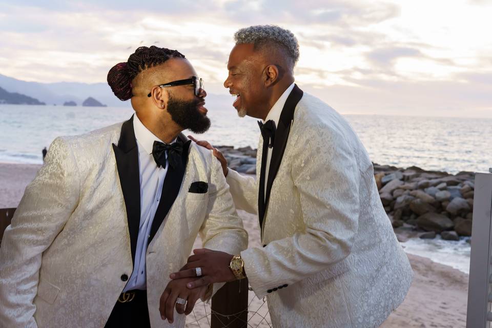 Gay couple on beach in Mexico