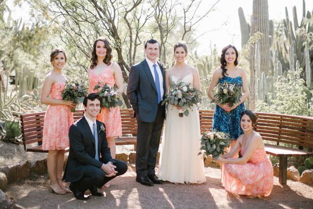 The couple with the bridesmaids and groomsmen