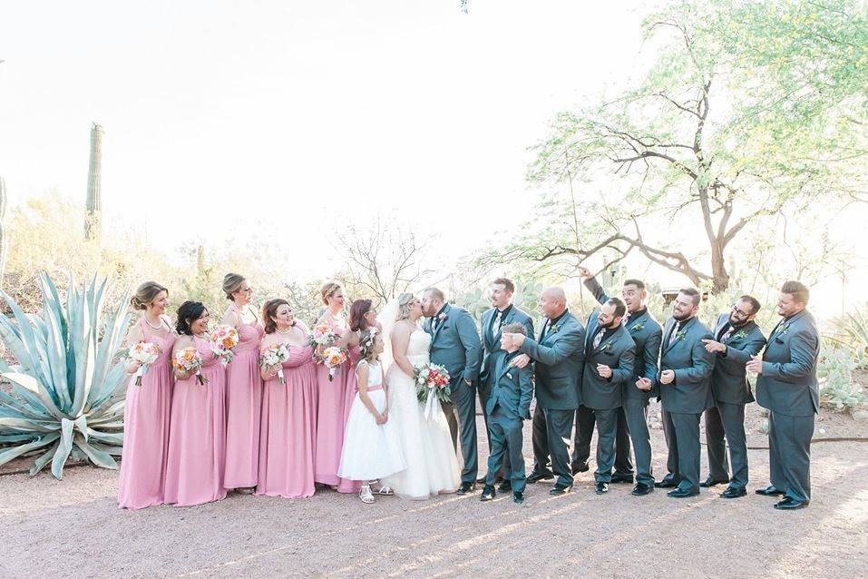 The couple with the bridesmaids and groomsmen