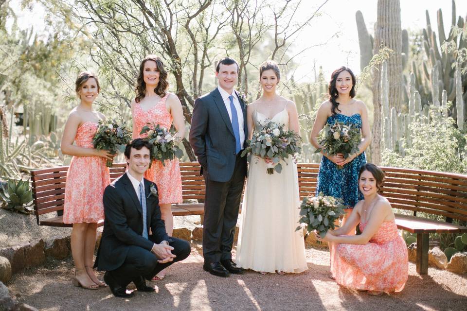 The couple with the bridesmaids and groomsmen