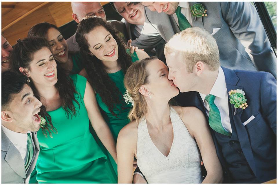 The couple with the bridesmaids and groomsmen