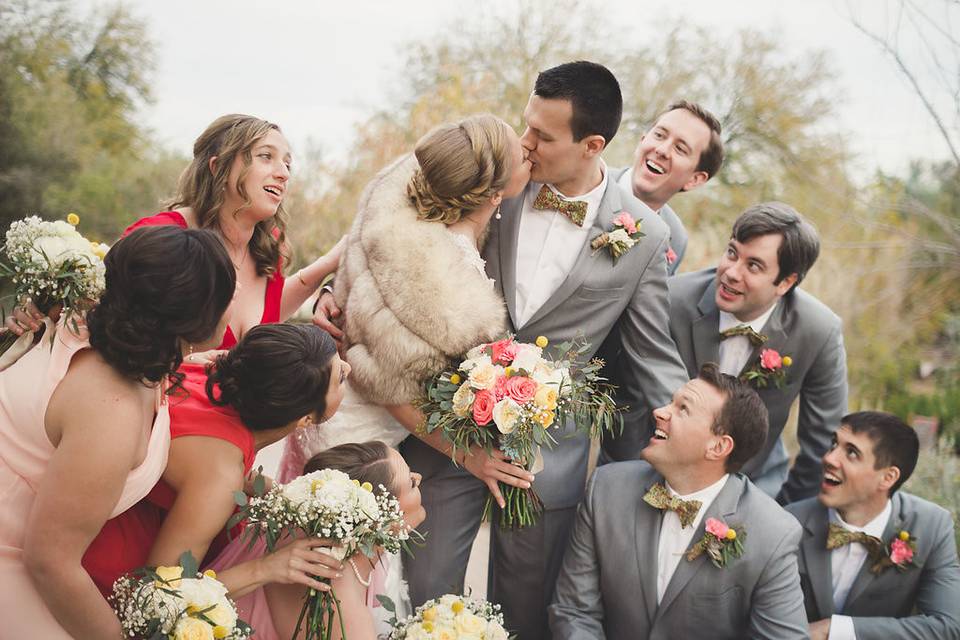 The couple with the bridesmaids and groomsmen