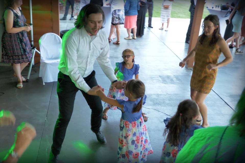 Dancing with his daughters!