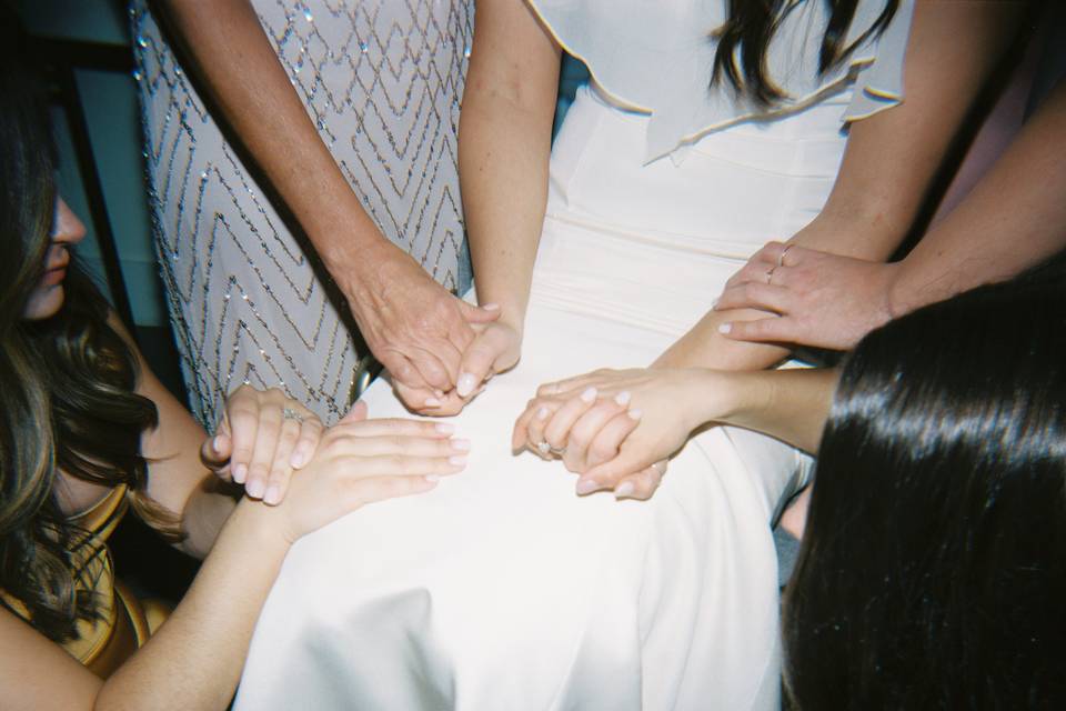 Holding hands, praying