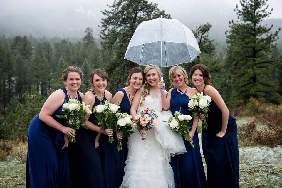 The rain/snow didn't stop the girls in this Rocky Mountain wedding from feeling fabulous!