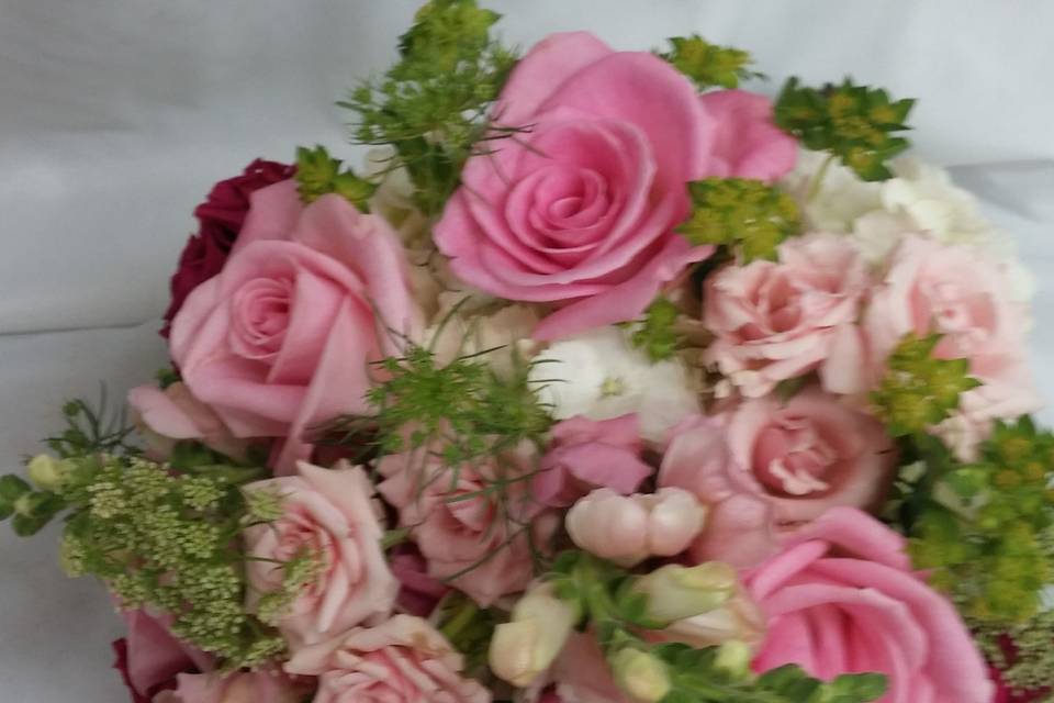 Brides bouquet with shades of pinks and greens