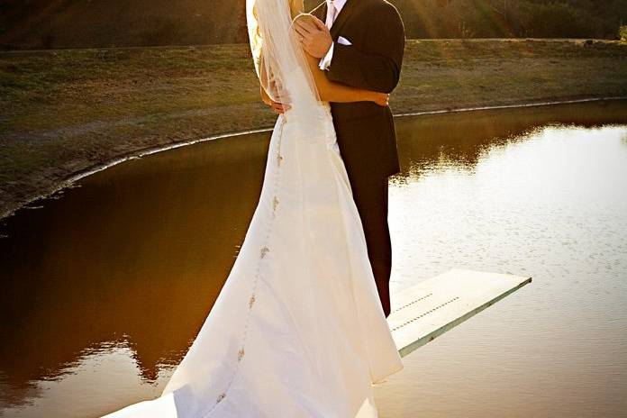 couple kissing at the end of a diving board at the holland ranch in san luis obispo