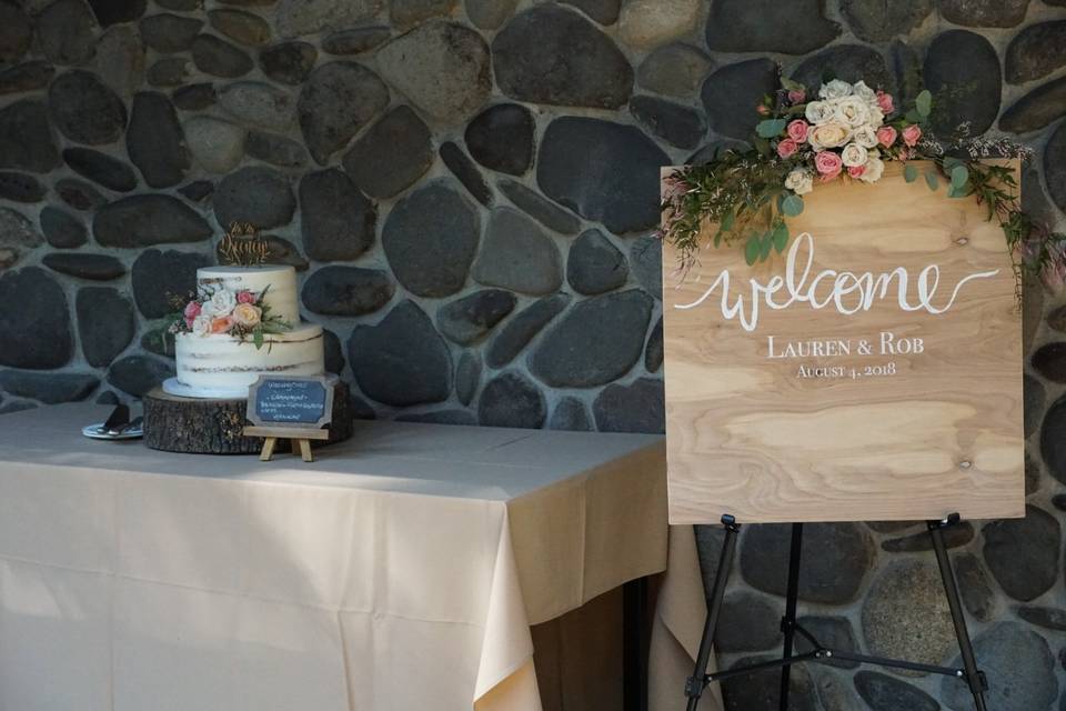 Cake table and welcome sign