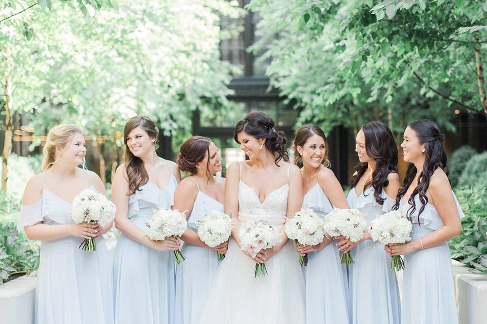 Bridal party posing outside