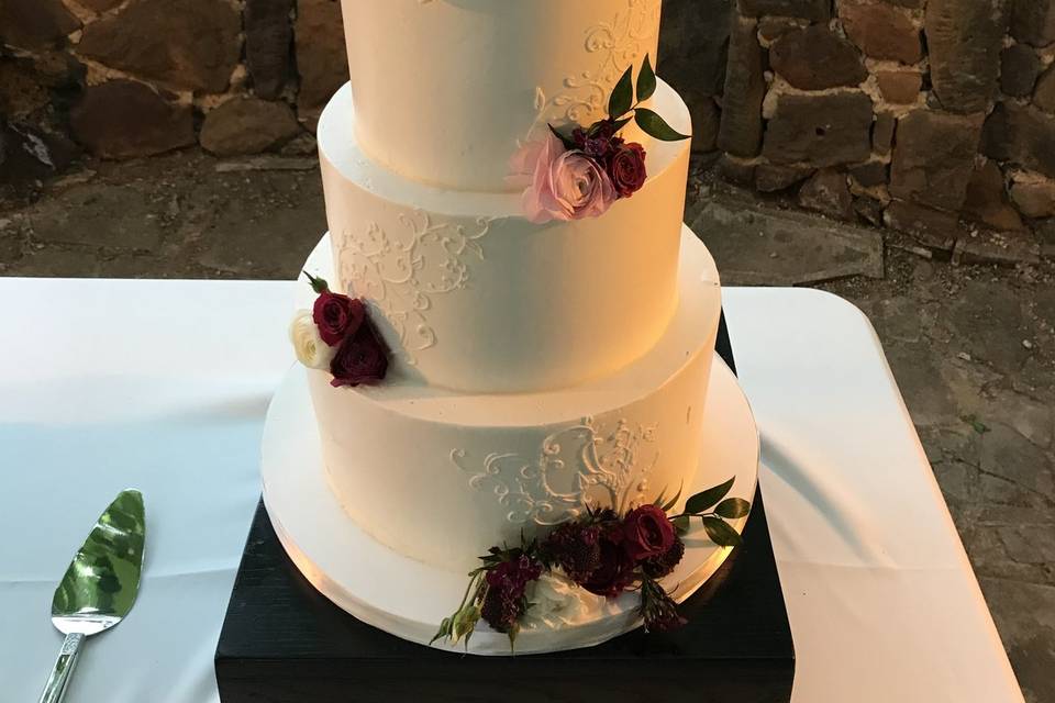 Piped scrolls and leaves