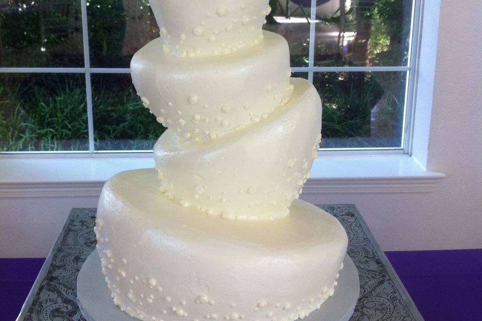 Topsy turvy white wedding