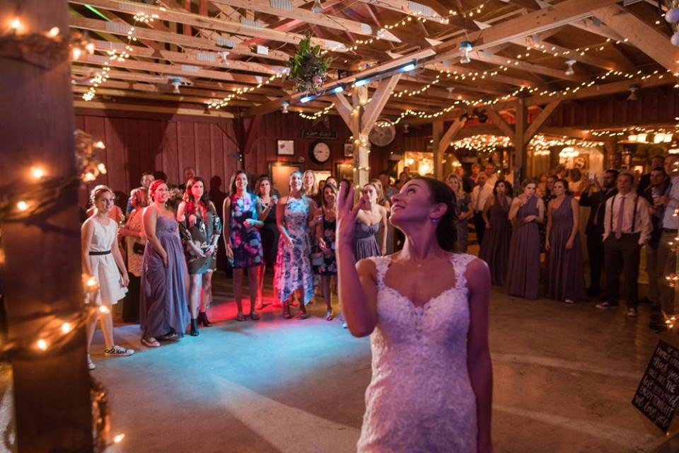 Bouquet toss on dance floor