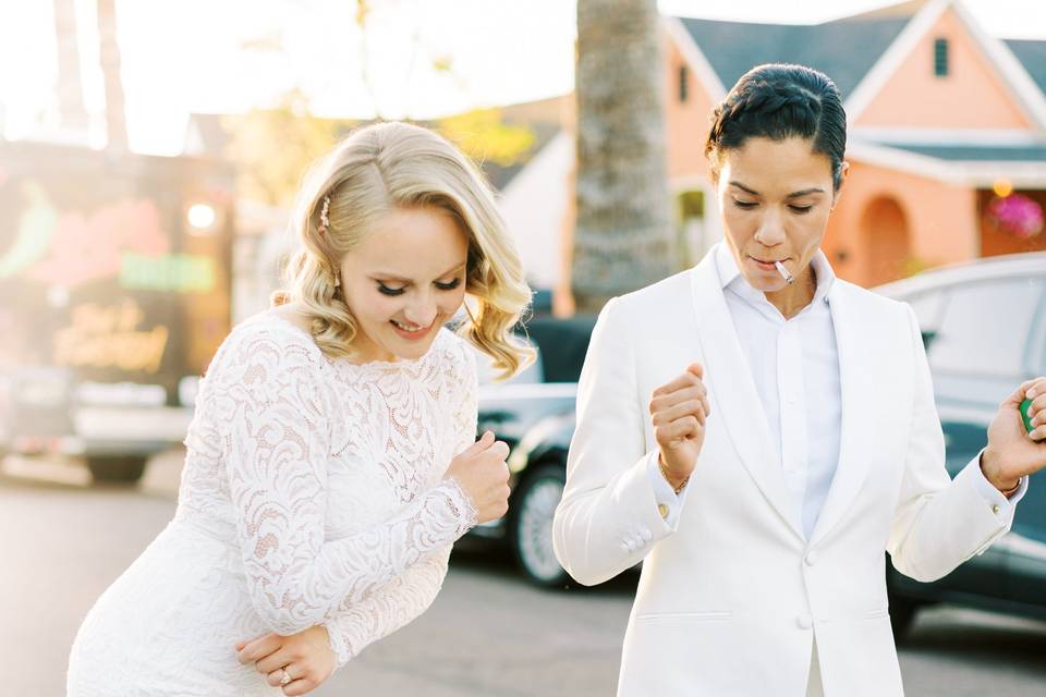 Brides dancing in the street