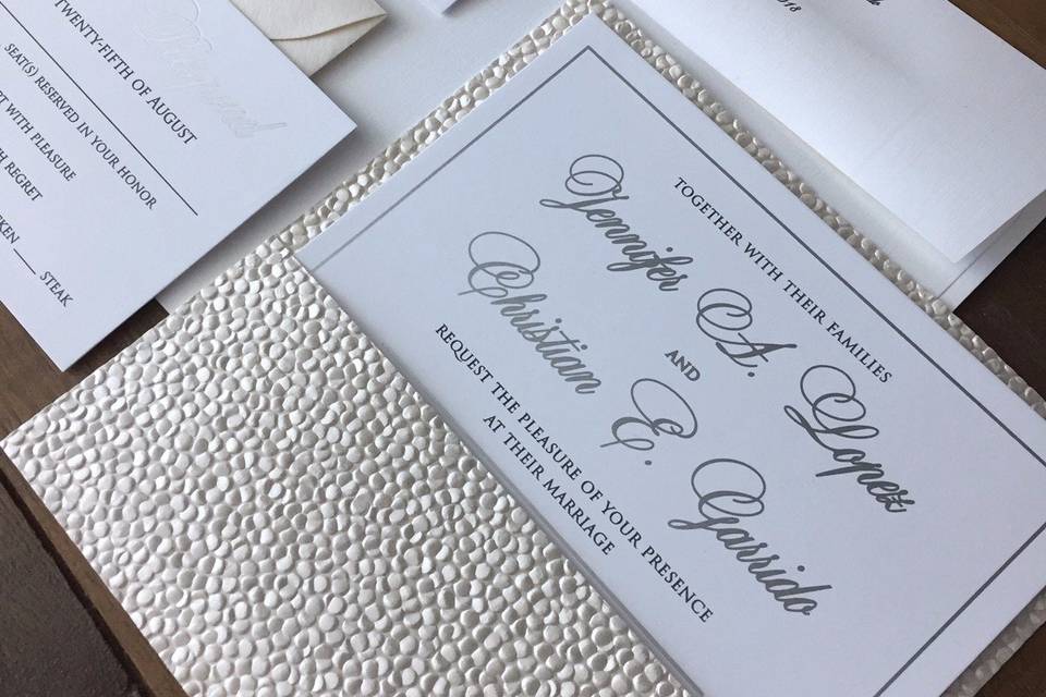 Pebbled wedding invitation