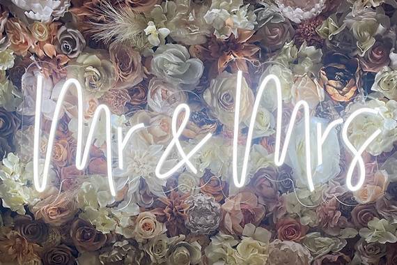 LED sign and flower wall