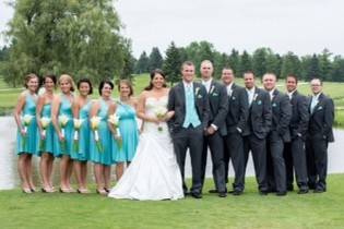 The newlyweds with the wedding attendants