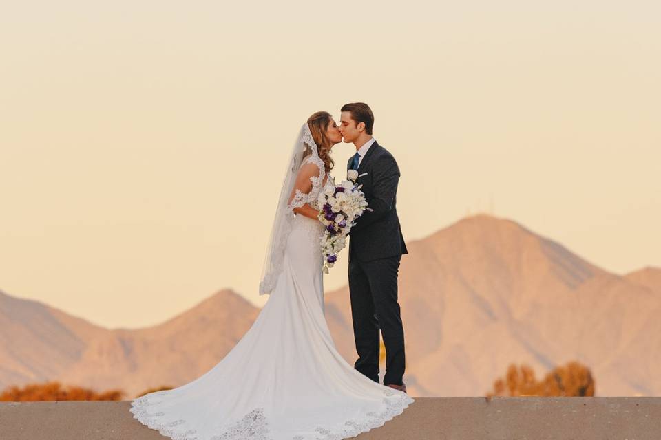 Couple beneath a beautiful sky