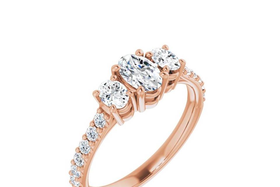 Accented three stone ring