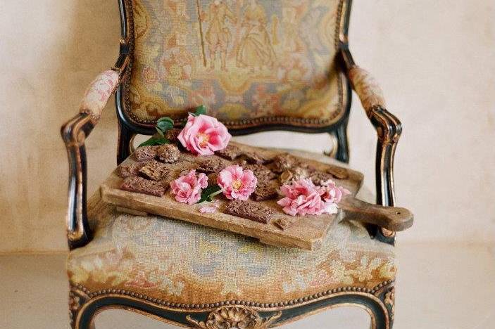 Antique chair from Merryl Brown Events with chocolates by Sweet Nuit — at Sunstone Winery.