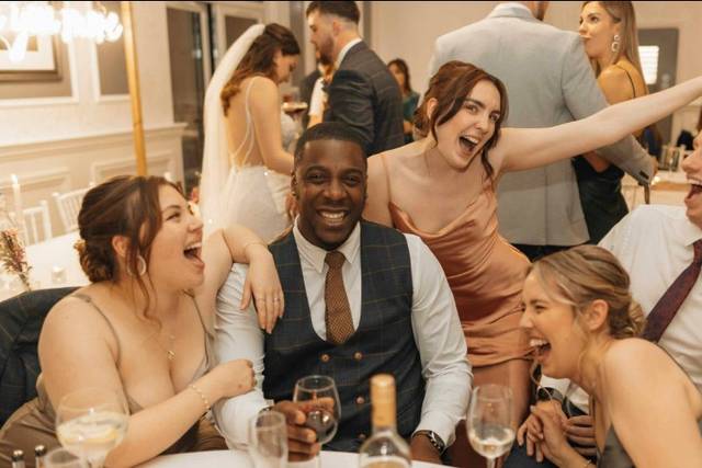 Guests laughing together at a