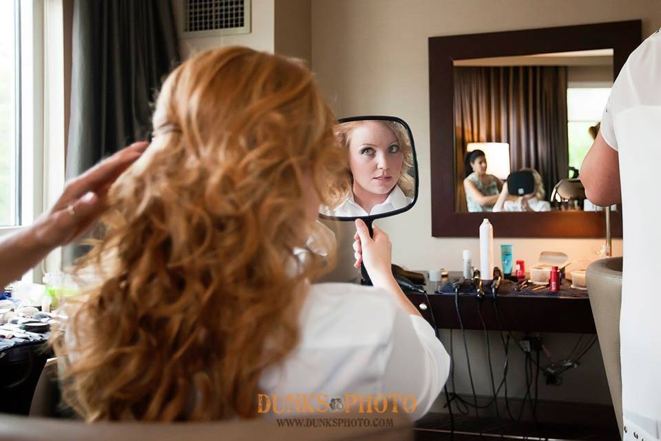 Bride looking in a mirror