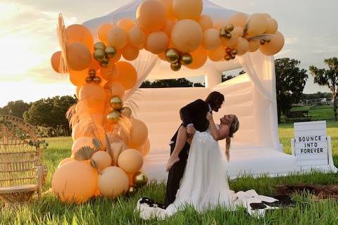 White wedding bounce house