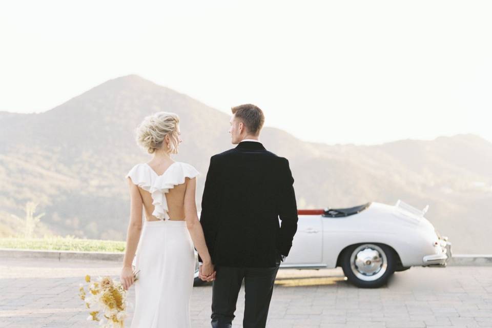 Couple and vintage car