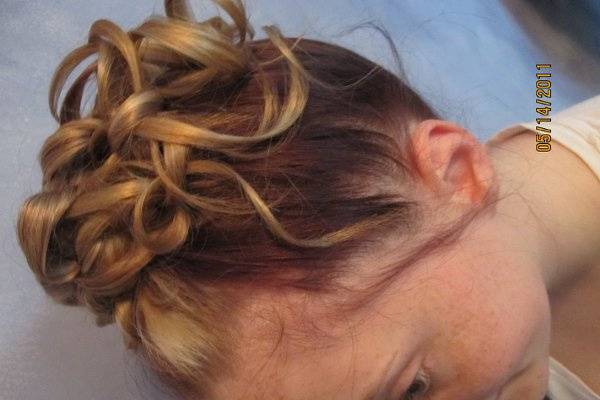 upside down French Braid with ribbon curls twisted into each other and hanging