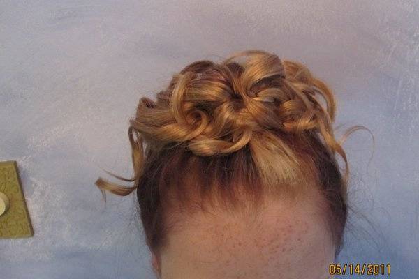 Hair...top view of Ribbon curls twisted into each other...top french braid, with the back having an upside down french braid with hair elegantly coming up into ribbon curls in twinning into each other.  A style to last for days.