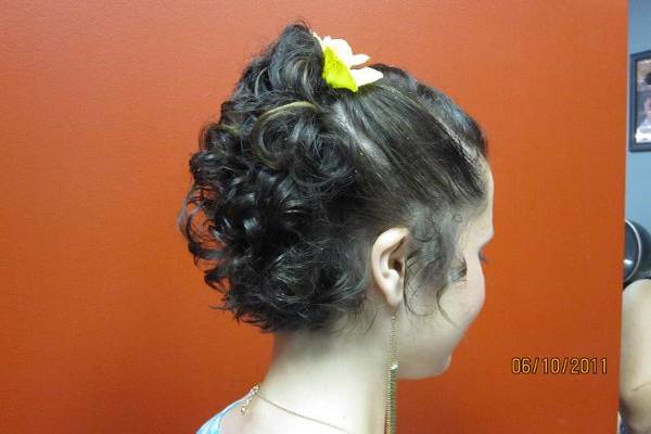 busy back with pinned up curls...tightly pulled back with small flower to match dress