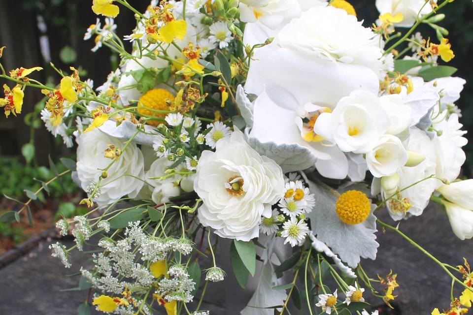 White and yellow orchid boquet