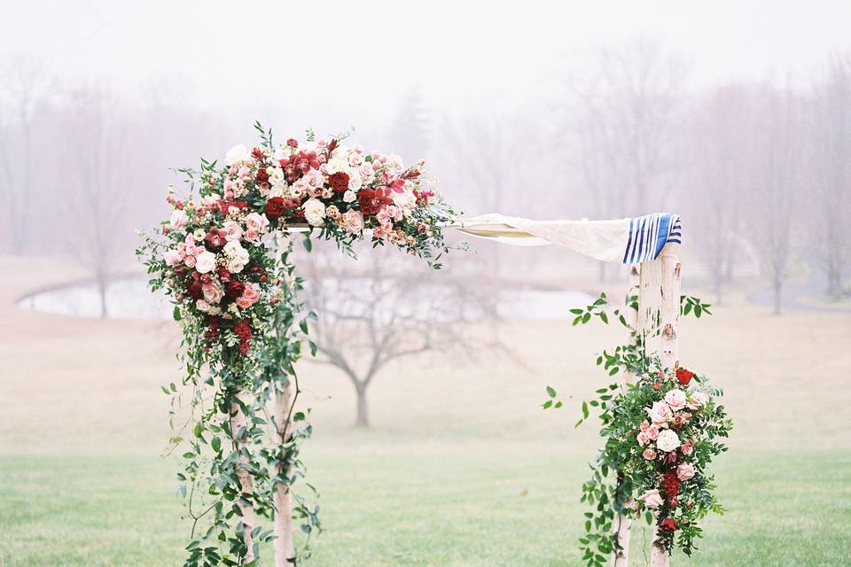 Red and pink floral Chuppah