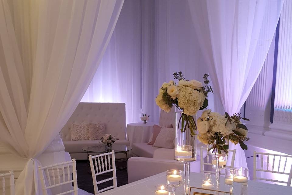 Table with floral and candle centerpiece