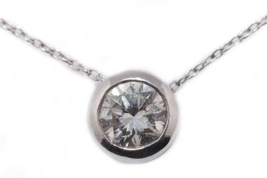 Bezel-set diamond pendant
