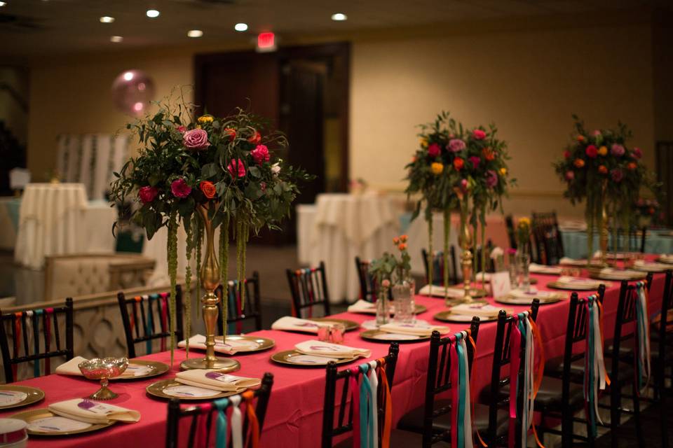 Head table setting and floral centerpieces