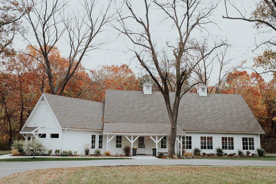 White Barn Exterior by Bobarikin Photography