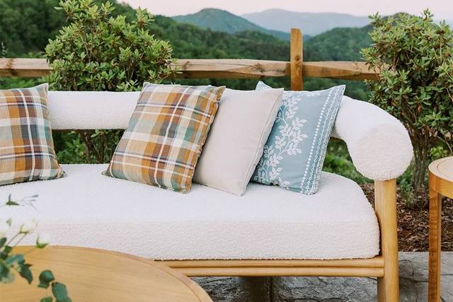 Lounge sofa with plaid pillows
