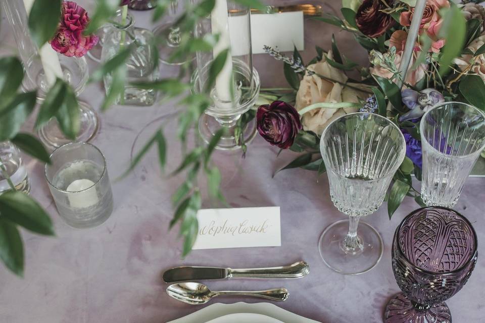 Purple and white table setting