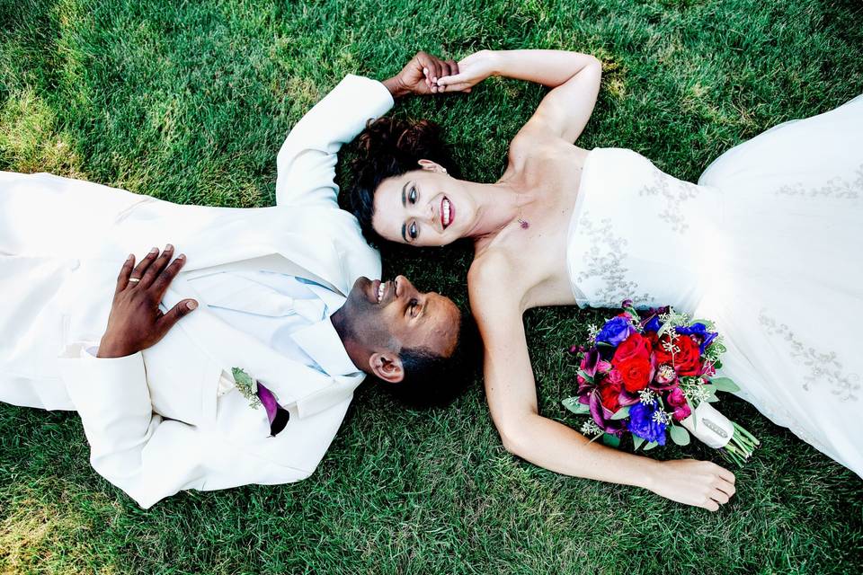 Bride and Groom laying down