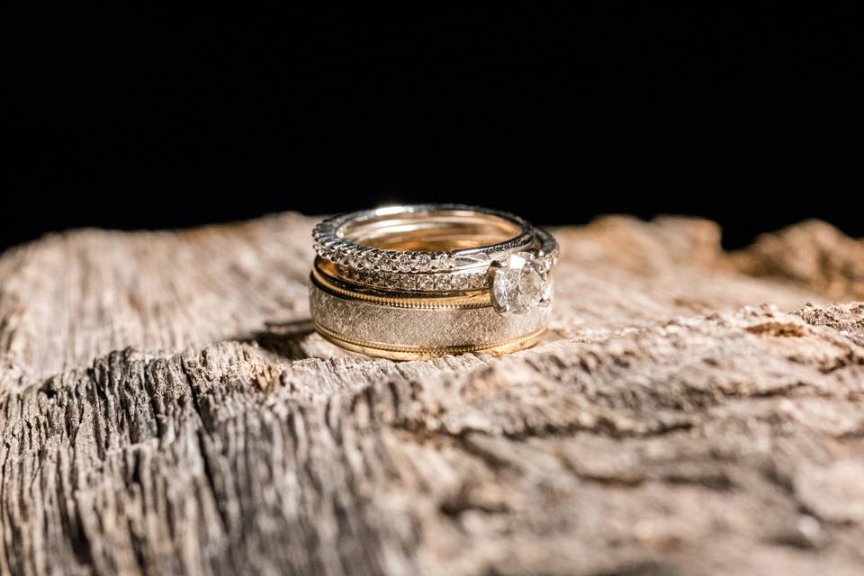 Wedding rings on beach wood