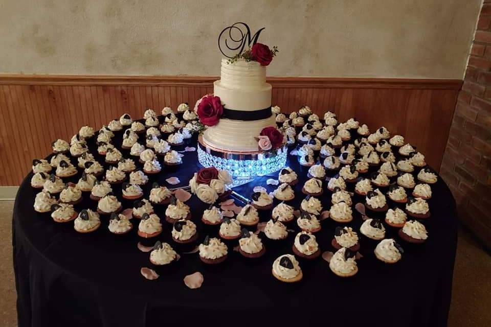 Wedding cake and cupcakes