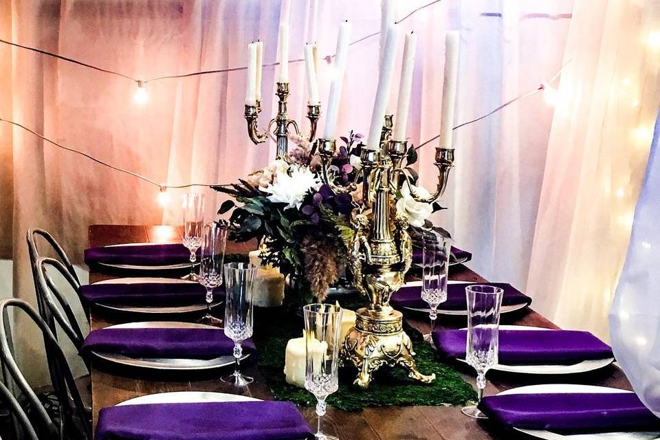 Silver and purple wedding tabl